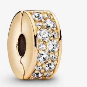 Authentic 14K yellow gold clear pave Pandora clip charm.